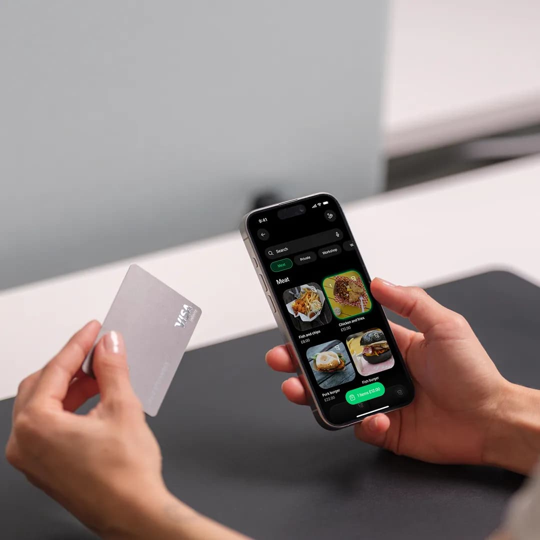 A customer taps a payment card on a phone running the Tapp till